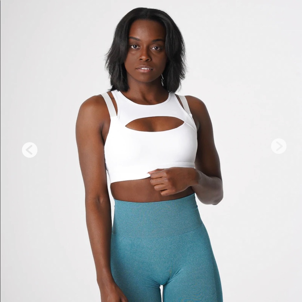 NVGTN sports bra size medium. New with tags in bag
